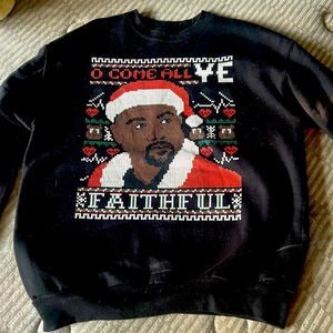 It’s a medium Kanye sweater. I used to love it but now it just collects dust.